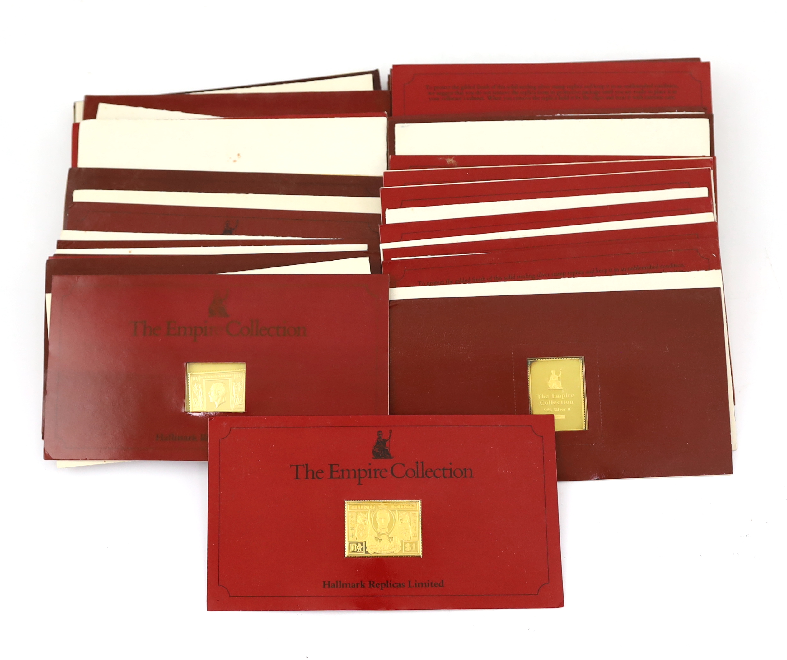 ‘The Empire Collection’, twenty five silver-gilt stamp replica ingots, in individual packets, approx. 471g